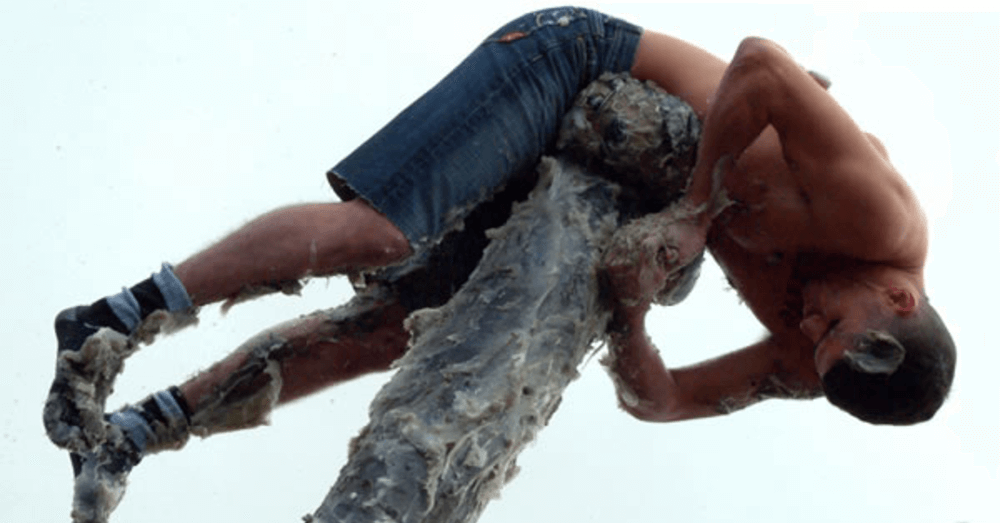 This Scottish Town Makes People Climb a Greased-Up Pole for Ham Wrapped in Barbed Wire